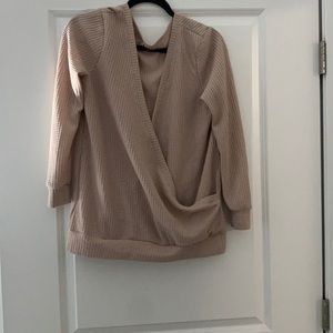 Cute wrap top worn once. Light pink/blush